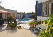 Отдельно стоящий дом с участком на продажу в городе Playa Flamenca I Фото