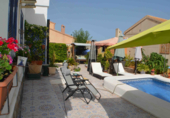 Отдельно стоящий дом с участком на продажу в городе Playa Flamenca I Фото