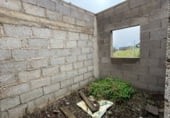 Участок с постройкой на продажу в городе La Esperanza Фото