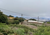 Участок с постройкой на продажу в городе La Esperanza Фото
