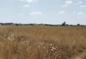 Земля на продажу у города Cubillos Фото