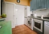 Отдельно стоящий дом с участком на продажу в городе La Vecilla de Curueño Фото