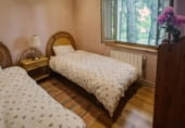 Отдельно стоящий дом с участком на продажу в городе La Vecilla de Curueño Фото