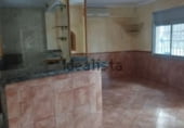 Участок с постройкой на продажу в городе Cornellà de Llobregat Фото