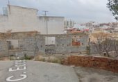 Участок с зданием в плохом состоянии на продажу в городе Oliva Фото