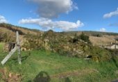 Дом с участком на продажу в городе A Estrada Фото
