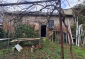 Загородный дом с участком на продажу в городе Bembibre Фото