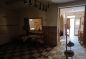 Дом с участком на продажу в городе Альманса Фото