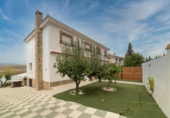 Отдельно стоящий дом с участком на продажу в городе Padul Фото