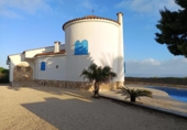 Отдельно стоящий дом с участком на продажу в городе l'Ametlla de Mar Фото
