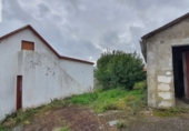Отдельно стоящий дом с участком на продажу в городе Narón. Фото