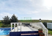 Отдельно стоящий дом с участком на продажу в городе Zafra. Фото