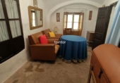 Дом с участком на продажу в городе Sierra de Fuentes. Фото