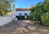 Дом с участком на продажу в городе Villaluenga de la Sagra. Фото