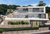Отдельно стоящий дом с участком на продажу в городе Calpe. Фото