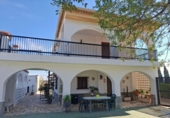 Отдельно стоящий дом с участком на продажу в городе Ontinyent Фото