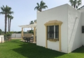 Дом с участком на продажу в городе San Juan de los Terreros Фото