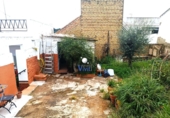Дом с участком на продажу в городе Alcalá de Guadaíra. Фото