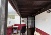 Таунхаус с участком на продажу в городе La Aldea de San Nicolás. Фото