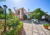 Отдельно стоящий дом с участком на продажу в городе Villa de Otura Фото