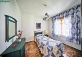 Отдельно стоящий дом с участком на продажу в городе Villa de Otura Фото