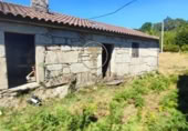 Дом с участком на продажу в городе Виго. Фото