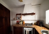 Дом с участком на продажу в городе Grazalema. Фото