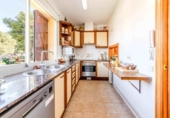 Отдельно стоящий дом с участком на продажу в городе Calafell Фото