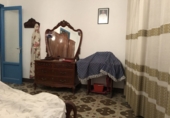 Дом с участком на продажу в городе Усерас. Фото