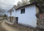 Дом с участком на продажу в городе Langreo. Фото