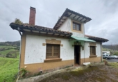Отдельно стоящий дом с участком на продажу в городе Villaviciosa Фото