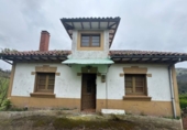 Отдельно стоящий дом с участком на продажу в городе Villaviciosa Фото