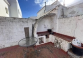 Дом с участком на продажу в городе Es Castell Фото