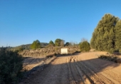 Земля, подлежащая урбанизации на продажу у города Corbera d'Ebre Фото