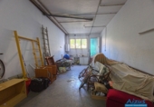 Дом с участком на продажу в городе Ripollet. Фото