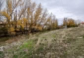 Городская земля под застройку на продажу у города Olombrada Фото