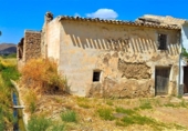 Загородный дом с участком на продажу в городе Arboleas Фото