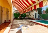 Chalet independiente con terreno en venta en la España, Marchena, ref: TR156548 foto