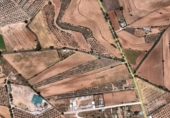 Земля на продажу у города Albolote Фото