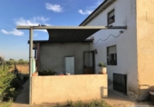 Отдельно стоящий дом с участком на продажу в городе Rociana del Condado Фото
