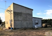 Отдельно стоящий дом с участком на продажу в городе Rociana del Condado Фото