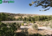 Дом с участком на продажу в городе Alamedilla Фото