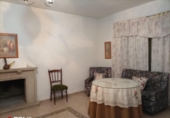 Отдельно стоящий дом с участком на продажу в городе Alcuéscar Фото