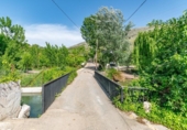 Отдельно стоящий дом с участком на продажу в городе Loja Фото