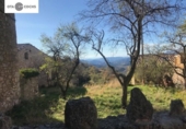 Участок с постройкой на продажу в городе Cornudella de Montsant Фото