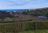 Земля на продажу у города Comillas Фото