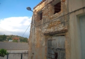 Отдельно стоящий дом с участком на продажу в городе el Perelló Фото