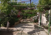 Загородный дом с участком на продажу в городе Huelma Фото