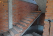 Отдельно стоящий дом с участком на продажу в городе Томиньо Фото