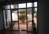 Отдельно стоящий дом с участком на продажу в городе Chiclana de la Frontera Фото